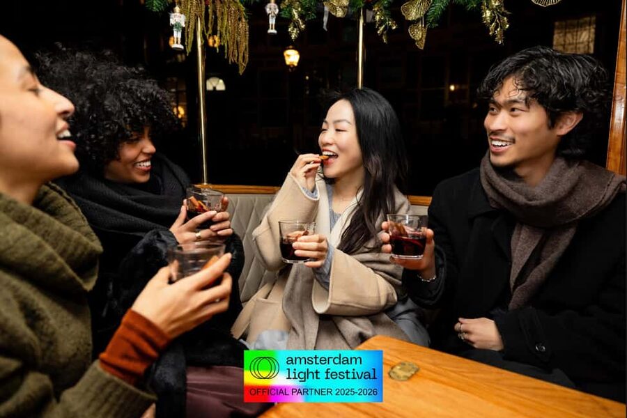 Amsterdam: Light Festival Cruise + Stroopwafel & Hot Choco - Herengracht, Haarlemmersluis, and the final approach
