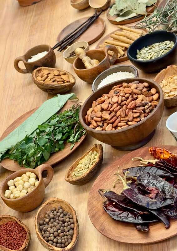Bean to Beverage: Roast and grind cacao into chocolate - Roasting cacao beans over the first stage of the class
