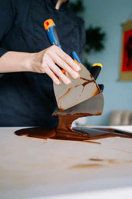 Bruges: Belgian Chocolate Making Workshop with Beer Tasting - Making pralines at Langestraat 52