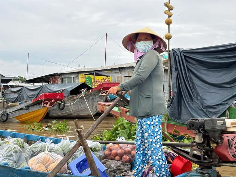 Can Tho: Floating Market, Cacao & Canals with French Guide - Reaching Cai Rang Floating Market by sampan