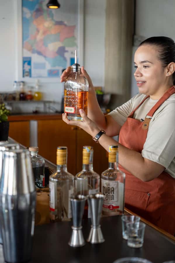 Cartagena: Express Rum and Chocolate Tasting Experience - Finding Caffé Lunático above Hostel El Santuario