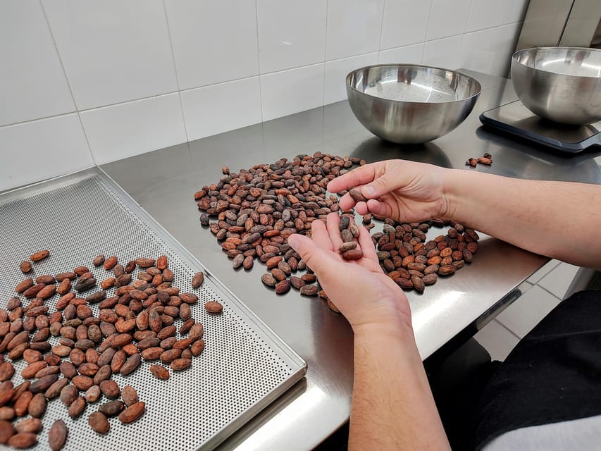 Chocolatier for a day: raw bean to bar chocolate in Modica - Grinding and refining with traditional methods