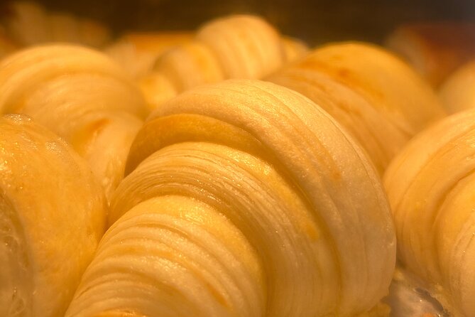 Croissants and pains au chocolat with a pastry chef in Paris - Shaping croissants and pains au chocolat