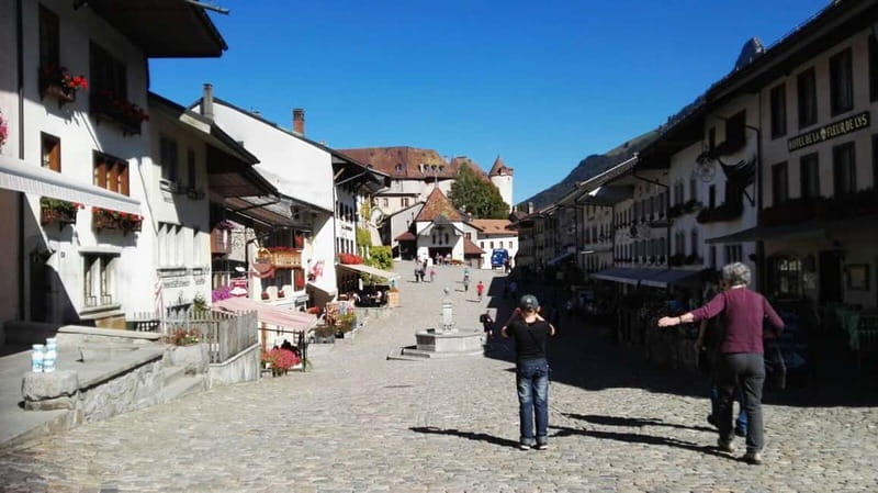 From Geneva: Gruyères Tour with Cheese & Chocolate Factories - The GoldenPass Panoramic train from Montbovon