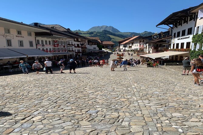 Gruyères Castle, Cheese, and Chocolate Tour | From Zurich - Watching Gruyères cheese take shape