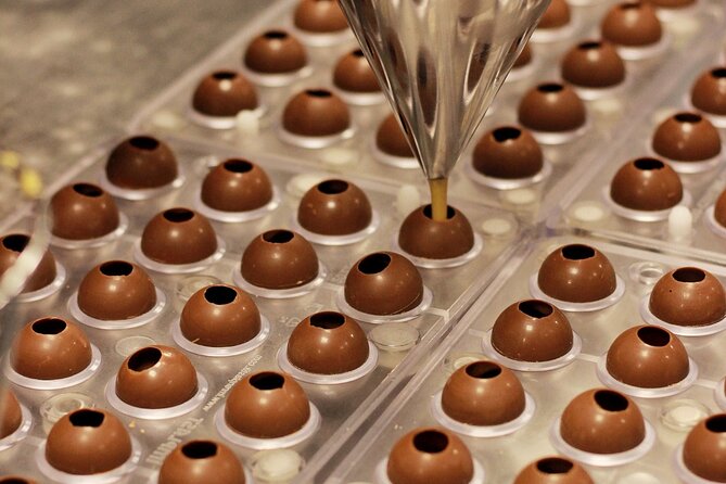 Guided Tour of the Chocolate Factory: Tasting Included - Watching the factory floor at work