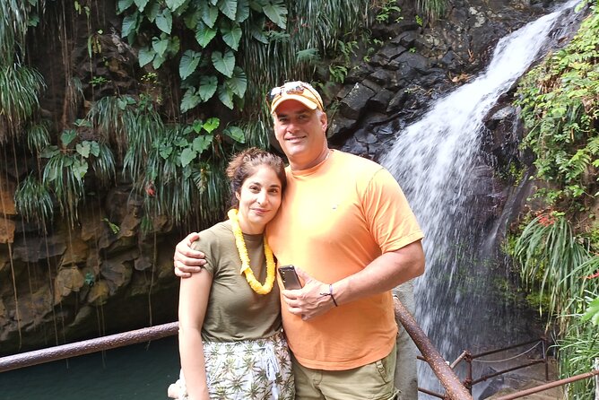 Half-Day Hawaiian Leis Chocolate Waterfalls Beach Tour - Cooling off at Annandale Waterfall