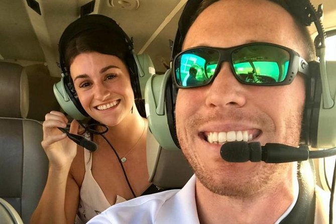 New Orleans VIP Sightseeing Flight with Champagne & Chocolates or Wine & Cheese - French Quarter rooftops and the Crescent City curve