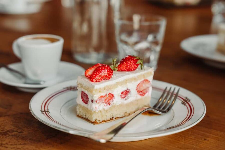 Paris: Pastries and Chocolate Walking Food Tour - Tea, cake, and old Paris at Le Valentin Jouffroy