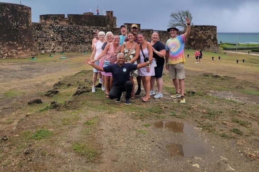 Puerto Plata: City Tour with Rum and Chocolate Factories - Umbrellas, pink walls, and quick city photos