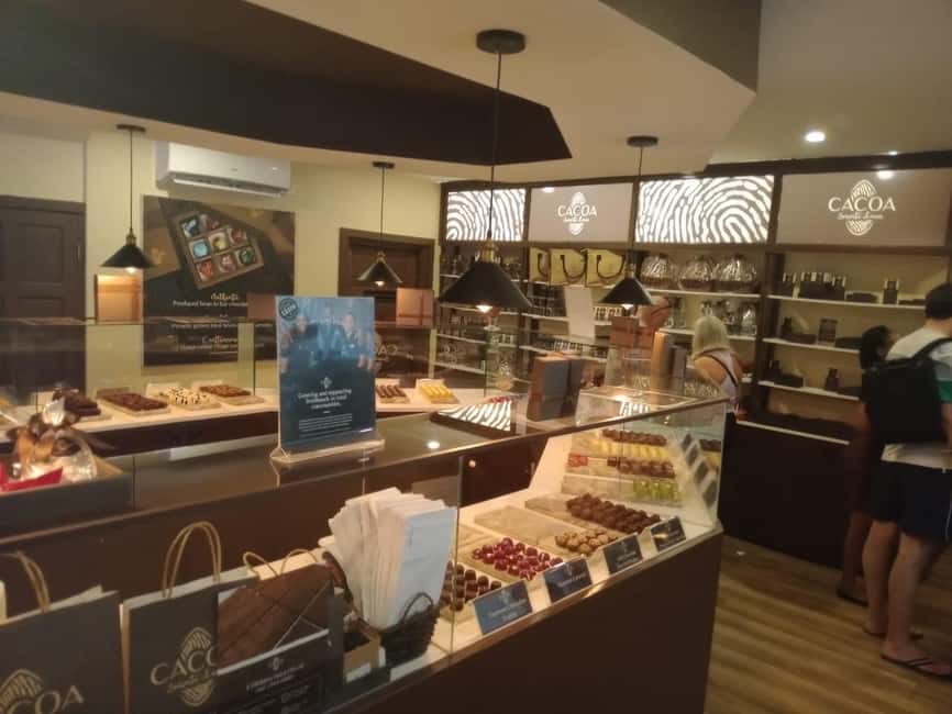 St. Lucia: Rum Distillery and Chocolate Making Experience - Canaries and Anse La Raye add local color