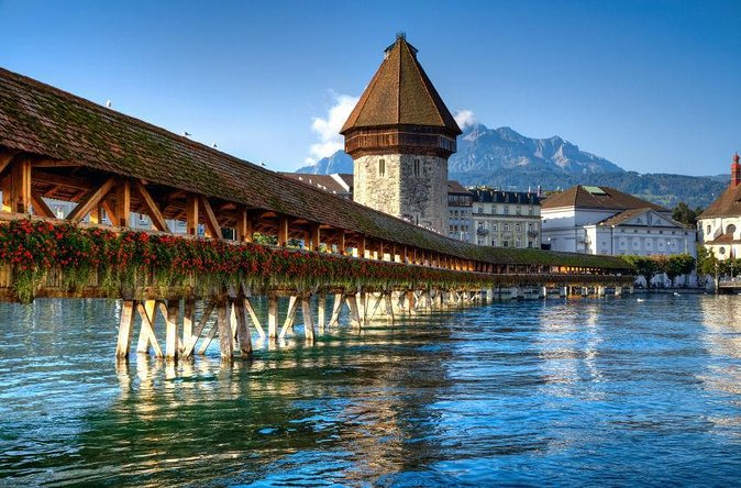 Tony<code>s private city tour with picnic & chocolate degustation – Key points at a glance’ /></p>
<ul>
<li><strong>A private two-person experience:</strong> Your group is the only group on the tour, which makes the afternoon flexible and personal.</li>
<li><strong>A 3 pm hotel start:</strong> Pickup can begin at your hotel, a useful option when you want an easy introduction to Lucerne.</li>
<li><strong>A picnic beside Chapel Bridge:</strong> The tour combines a classic city sight with food prepared by your guide.</li>
<li><strong>Chocolate at the Lion Monument:</strong> The tasting gives you a sweet local stop instead of only taking photographs.</li>
<li><strong>Guides with personal strengths:</strong> Anthony has a photography background, while Ethan and Roberto have also led this experience.</li>
<li><strong>Weather matters:</strong> Poor conditions can lead to a new date or a full refund, and rain may affect the picnic setup.</li>
</ul>
<h2>Chapel Bridge gives the tour its first strong moment</h2>
<p>s private city tour with picnic & chocolate degustation – Chapel Bridge gives the tour its first strong moment’ /></p>
<p><p>Your afternoon begins at 3 pm, with pickup available from your hotel. You need to provide the hotel details when booking so the guide knows where to start. That small bit of planning can save you from finding a separate meeting point in a city where the old center is pleasant but unfamiliar streets can still slow you down.</p>
</p>
<p><p>The first named stop is <strong>Kapellbrücke, or Chapel Bridge</strong>, Lucerne’s famous covered wooden bridge. It crosses the Reuss River and gives you an immediate sense of the city’s setting, with water, old buildings, and the surrounding hills all close at hand. The bridge itself is free to visit, so your payment here covers the guide and the experience rather than an entrance fee.</p>
</p>
<p><p>The listed stop lasts about three minutes, but that should not be read as the full amount of time spent in the area. The tour also includes the old town, and the bridge works as an opening point for photographs and orientation. Your guide can help you understand where the bridge fits into Lucerne’s street plan and point out details that are easy to miss when you are rushing between photo stops.</p>
</p>
<p><p>The <strong>prepared picnic</strong> is the unusual part. Instead of treating the bridge as a quick photo background, the tour uses it as the setting for a food break. This can make the first part of the afternoon feel less like a checklist. You get a chance to sit, eat, and talk with your guide while the city moves around you.</p>
</p>
<p><p>There is one practical catch. This is an outdoor experience, and rain can make seating wet or less comfortable. One past booking suggested bringing a towel for damp seats and some kind of leg covering in poor weather. The provider noted that a cozy blanket is used in suitable conditions but not on rainy days, so bring a light waterproof layer and do not assume the picnic will feel the same in every forecast.</p>
</p>
<div class="twil" style="margin: 20px 0; padding: 15px 0;"><p>A few more chocolate tours around Switzerland worth a look</p><ul style="margin: 10px 0; padding-left: 0; list-style: none;"><li style="margin: 0 0 12px 0; padding: 0 0 12px 0; border-bottom: 1px solid #ECE0E6; line-height: 1.4;"><a href="https://chocolateescapes.com/puerto-plata-private-city-tour-with-mount-isabel-rum-chocolate/">Puerto Plata Private City Tour with Mount Isabel & Rum &Chocolate</a><br><span style="font-size: 0.82em; color: #555;"><span style="color: #7A1E4F;">★</span> 4.5 &nbsp;&middot;&nbsp; 123 reviews</span></li><li style="margin: 0 0 12px 0; padding: 0 0 12px 0; border-bottom: 1px solid #ECE0E6; line-height: 1.4;"><a href="https://chocolateescapes.com/customizable-roatan-private-tour-rum-chocolate-island-culture/">Customizable Roatán Private Tour: Rum, Chocolate & Island Culture</a><br><span style="font-size: 0.82em; color: #555;"><span style="color: #7A1E4F;">★</span> 5.0 &nbsp;&middot;&nbsp; 115 reviews</span></li><li style="margin: 0; padding: 0; border-bottom: none; line-height: 1.4;"><a href="https://chocolateescapes.com/coffee-chocolate-private-tour-in-medellin-genuine-experience/">Coffee & Chocolate Private Tour in Medellin: Genuine Experience</a><br><span style="font-size: 0.82em; color: #555;"><span style="color: #7A1E4F;">★</span> 5.0 &nbsp;&middot;&nbsp; 100 reviews</span></li></ul></div><h2>The old town adds the local texture</h2>
<p><img width="669" height="446" decoding="async" src=