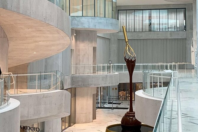 Tour in Lindt Home of Chocolate Museum From Zurich With pickup - Watching production through the panoramic windows